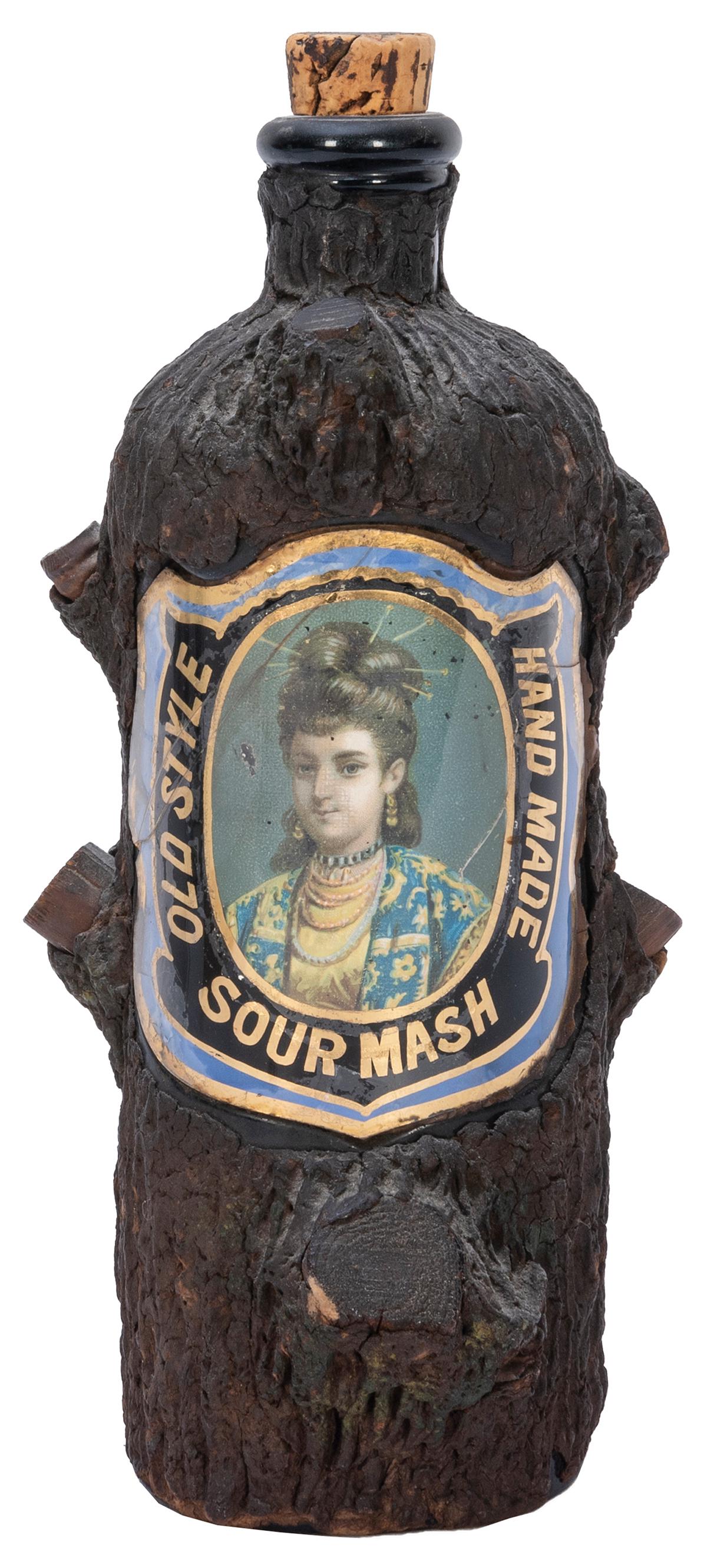 Old Style Sour Mash Bark Bottle. Circa 1900s. Simulated bark-covered bottle with reverse glass label (1 of 2)
