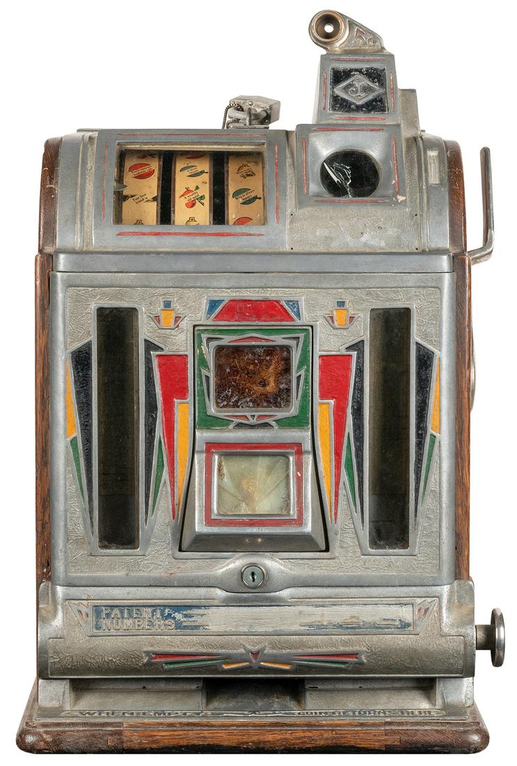 O.D. Jennings 5 Cent Slot Machine. [Chicago: O.D. Jennings, ca. 1920s]. Three-reel slot machine with (1 of 1)