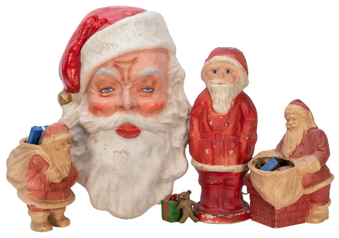Group of 4 papier-mache Santa Claus figurines, including a “Cell-U-Pon” lamp. [V.p., (1 of 1)