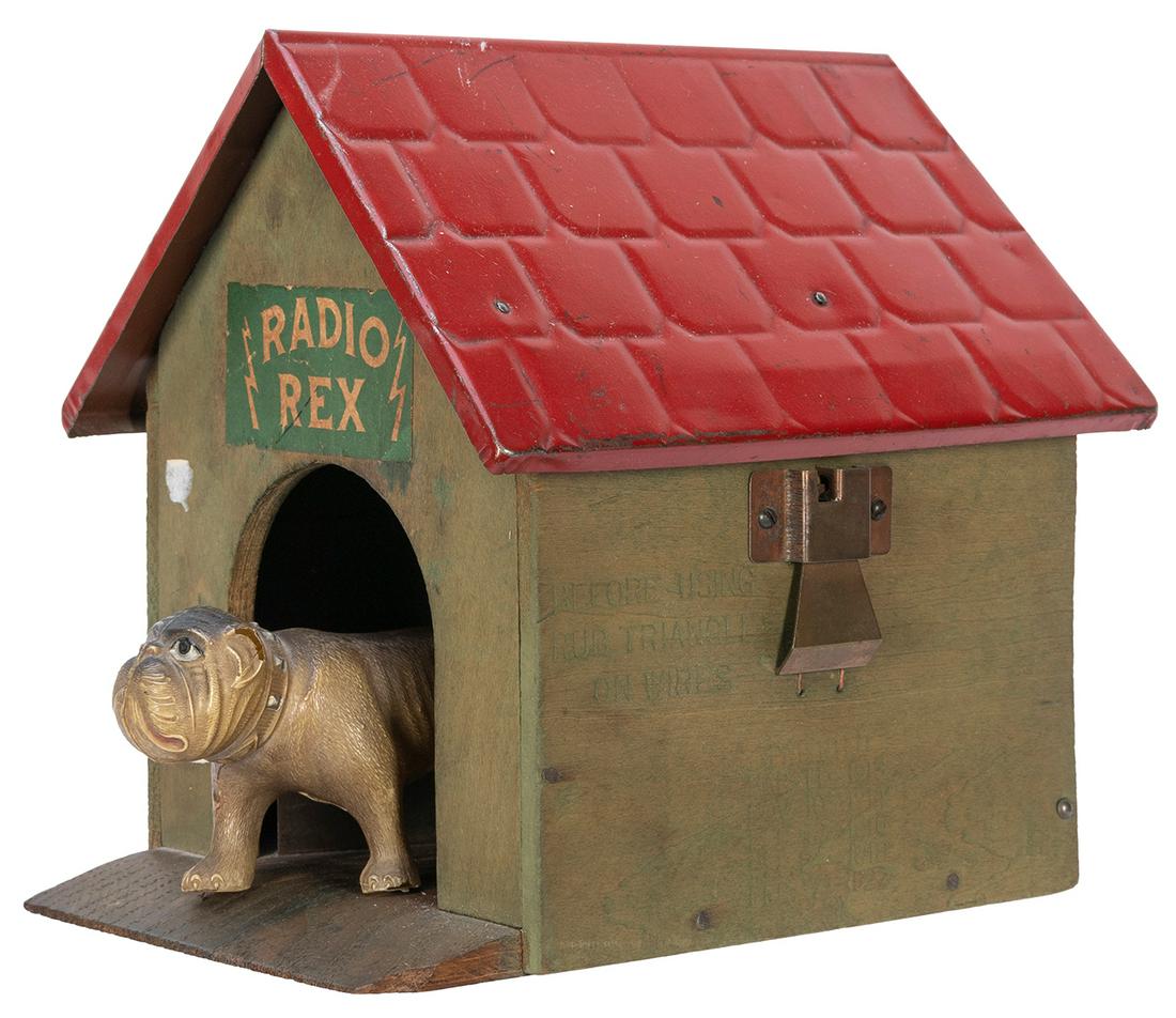Radio Rex Teletoy. New Haven, CT: John Hugo Manufacturing Co., 1910s. Green wooden kennel with metal (1 of 2)