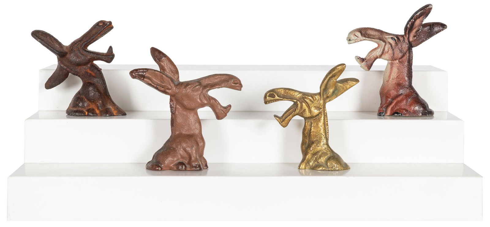 Group of 4 cast-iron figural bottle openers. (1 of 1)