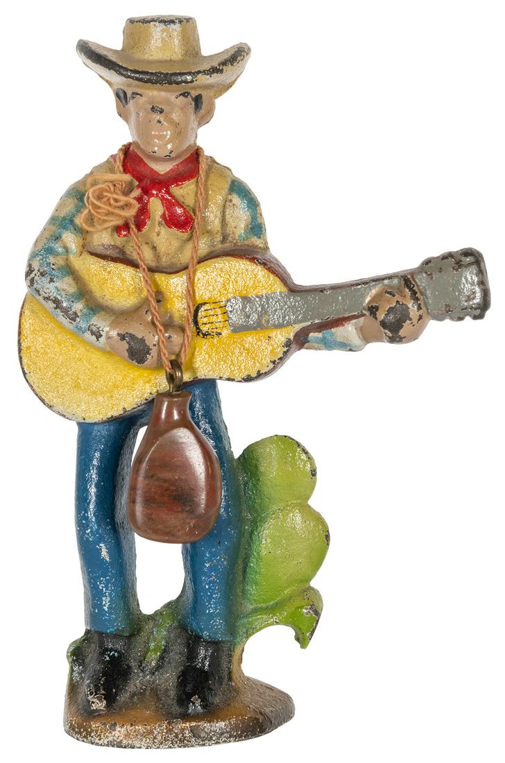 “Cowboy with Guitar” cast-iron figural bottle opener. (1 of 1)