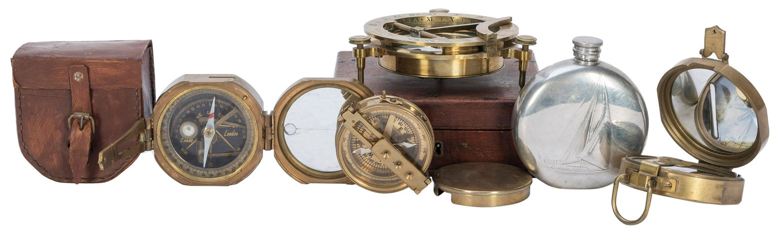Group of 4 brass nautical compasses, and a pewter flask. Including: Brass compass. London: Thomas (1 of 3)