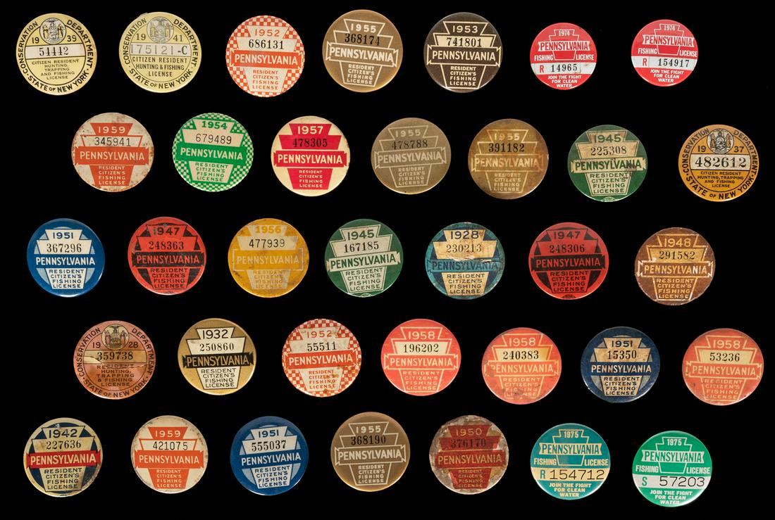 Collection of 34 fishing licenses for Pennsylvania and New York. 1928-1975. Laminated metal buttons (1 of 1)
