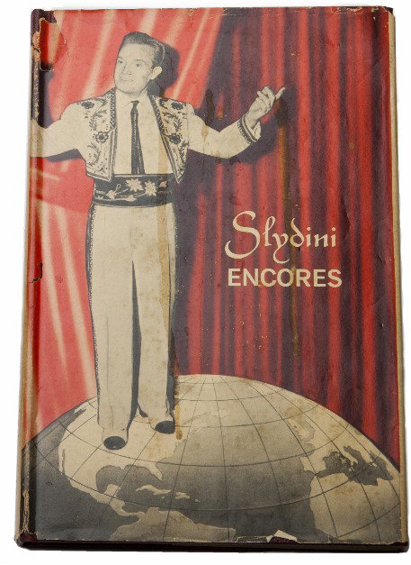 Nathanson, Leon. Slydini Encores. New York, 1966.: Nathanson, Leon. Slydini Encores. New York, 1966. Publisher's pebbled maroon cloth, illustrated with photographs. 8vo. Jacket tattered, otherwise condition. Inscribed and signed, "To Larry Jennings…