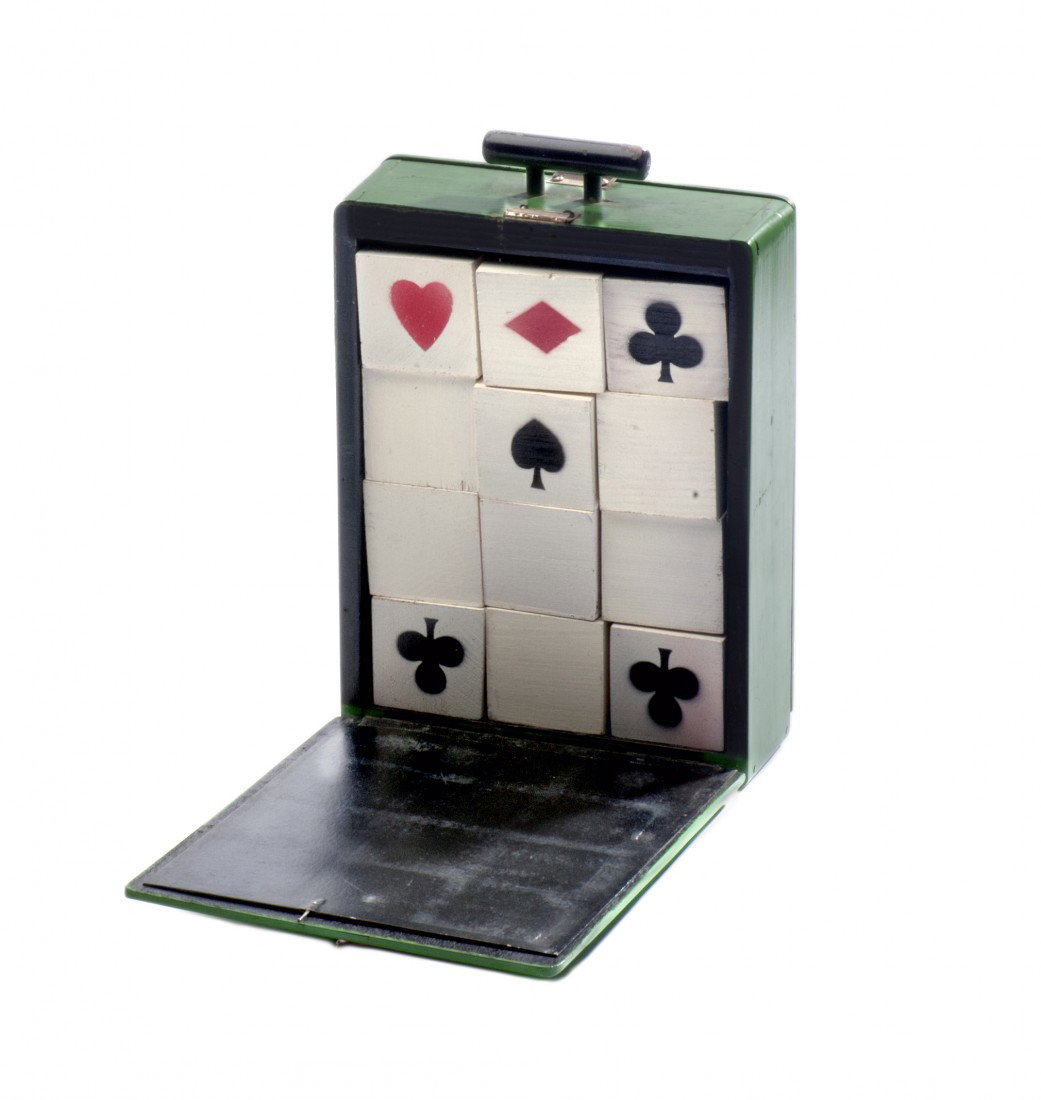 Curious Cubes. English, ca. 1950.: Curious Cubes. English, ca. 1950 [?]. Twelve wooden cubes are placed into a wooden cabinet with catalin knobs and magically rearrange themselves to reveal the identity of a selected card. Gimmick made