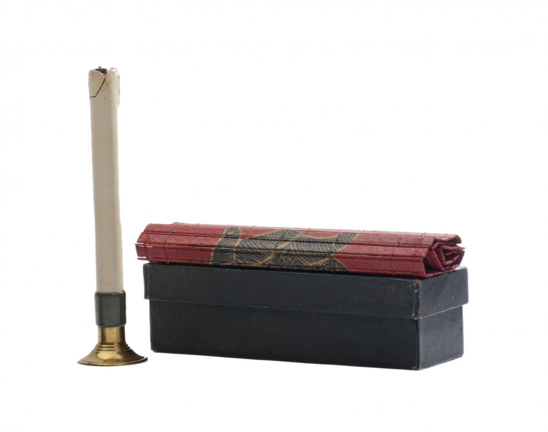 Fu Manchu's Silk Through Candle. Ca. 1940.: Fu Manchu (David Bamberg). Fu Manchu's Silk Through Candle. Edmund Spreer [?], ca. 1940. A silk handkerchief can be passed through the flame of this candle without being burned or damaged. Finely craf