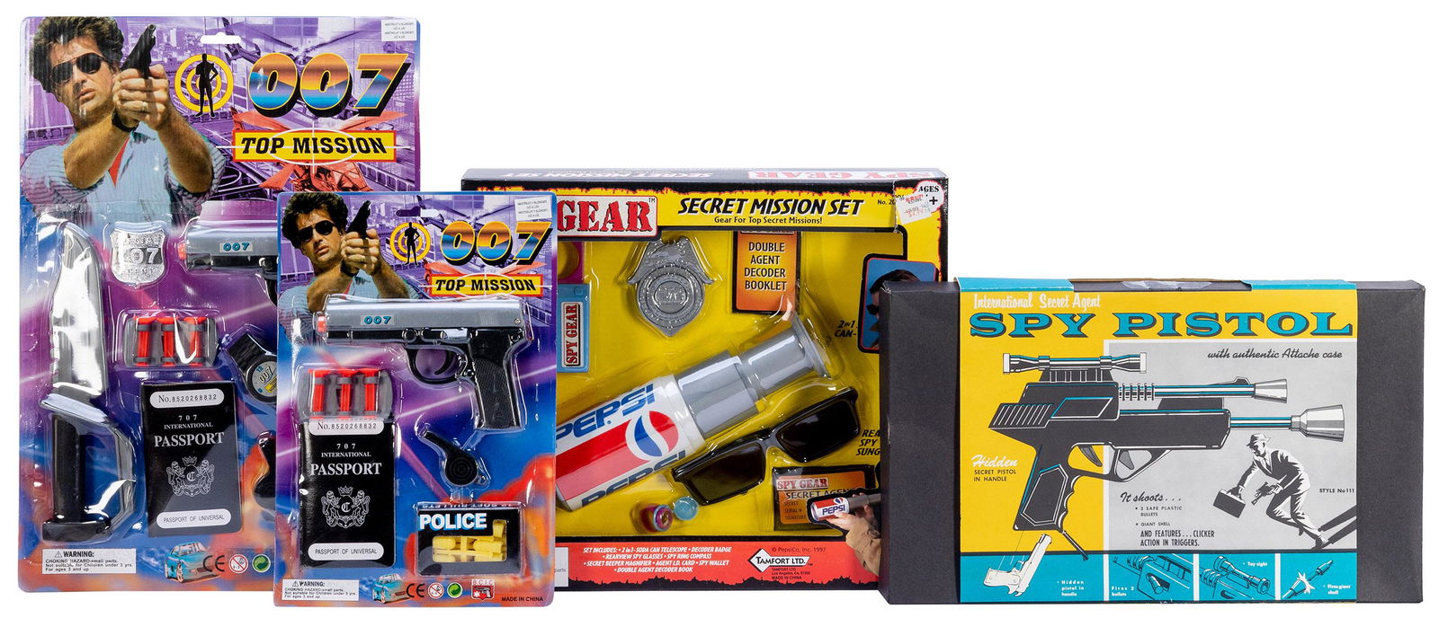 Group of 4 James Bond-inspired plays sets. Including Intern...: Group of 4 James Bond-inspired plays sets. Including International Secret Agent Spy Pistol with authentic Attache case. [N.p. (manufacturer’s name is missing from packaging), ca. 1960s]. Plastic