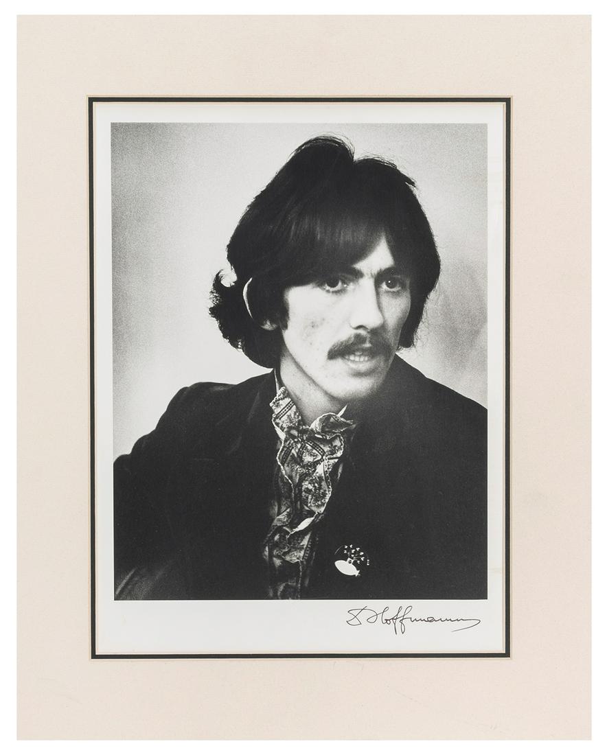 HARRISON, George (1943-2001), subject. HOFFMANN, Dezo (1912...: HARRISON, George (1943-2001), subject. HOFFMANN, Dezo (1912-1986), photographer. Portrait photograph of George Harrison. London: Dezo Hoffmann, Ltd., ca. 1970s. Black and white photograph of Harrison,