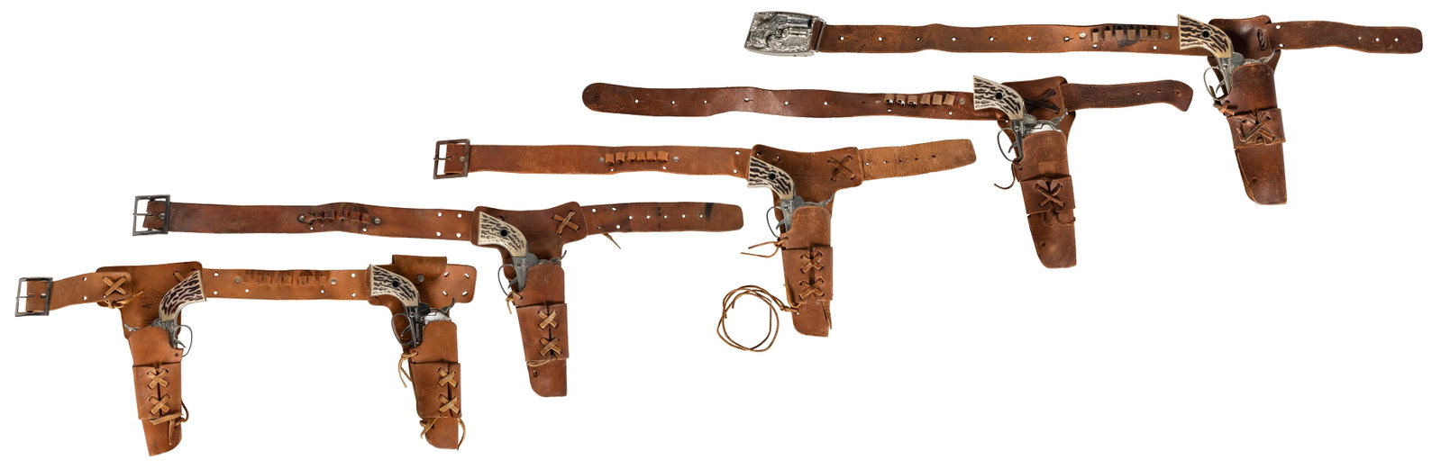 Group of 3 single Shooting Shot cowhide holsters with guns,...: Group of 3 single Shootin’ Shot cowhide holsters with guns, 1 double Shootin’ Shot cowhide holster with guns, 1 Shootin’ Shot cowhide holster with hidden Derringer gun in the buckle.