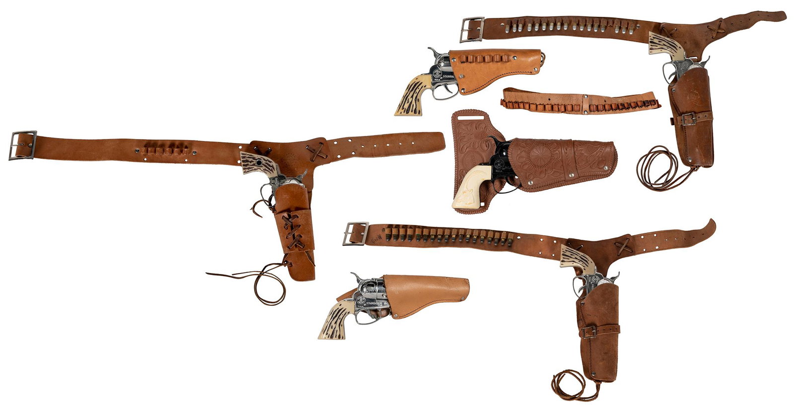 Group of 4 Fanner 50 cowhide holsters and belts with guns, ...: Group of 4 Fanner 50 cowhide holsters and belts with guns, 1 plastic Fanner 50 holster with gun, 1 Swivelshot leather holster with gun. Los Angeles: Mattel, Inc., ca. 1950-60s. Branded cowhide holster