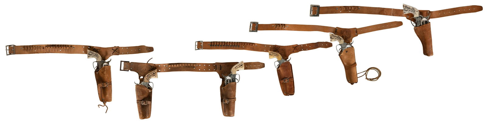 Group of 4 single Fanner 50 cowhide holsters with guns, and... (1 of 6)
