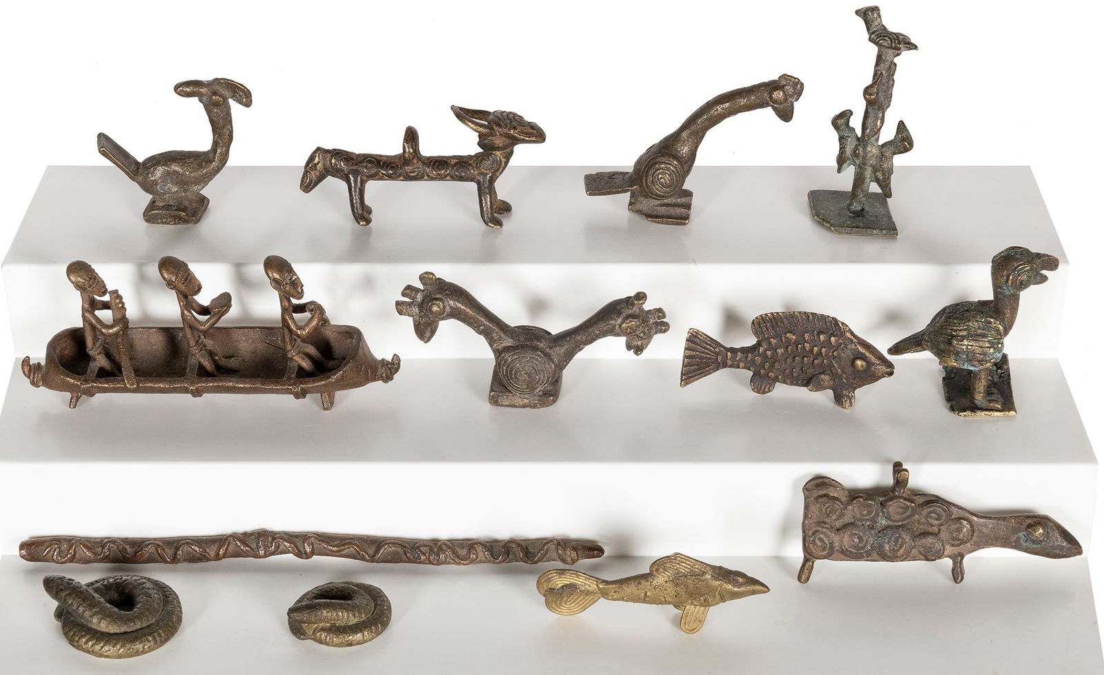 A group of 13 metal opium weights. [Thailand?, ca. 1880s]. ... (1 of 1)