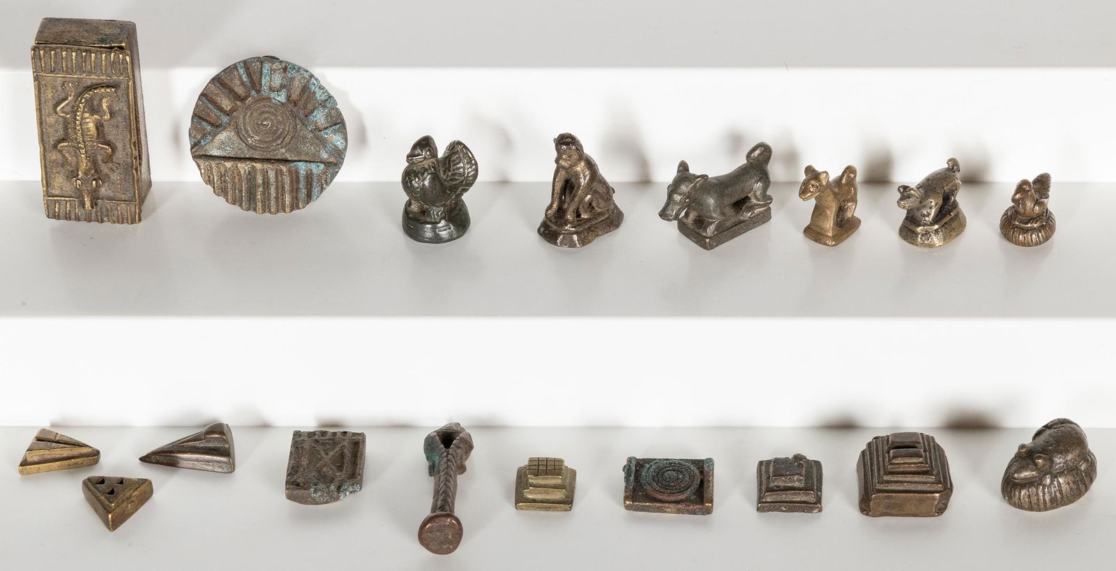 A group of 28 (mostly) Akan or Ashanti small opium goldweig... (1 of 1)