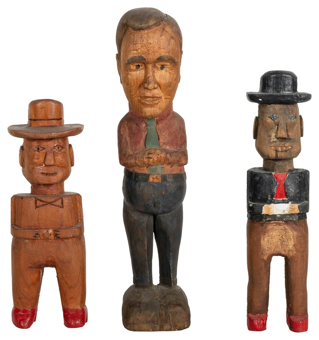 [FOLK ART]. A group of three hand-carved and painted men. [... (1 of 1)
