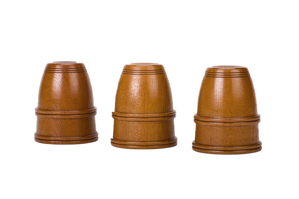 Wooden Cups. Japan, Mikame Craft. "Chopped" Set.: Wooden Cups. Japan, Mikame Craft, ca. 1980. Set of three handsome turned wooden cups for the traditional Cups and Balls routine. 3 ¼” tall, with an opening 2 5/8” diameter. All three are "chopped