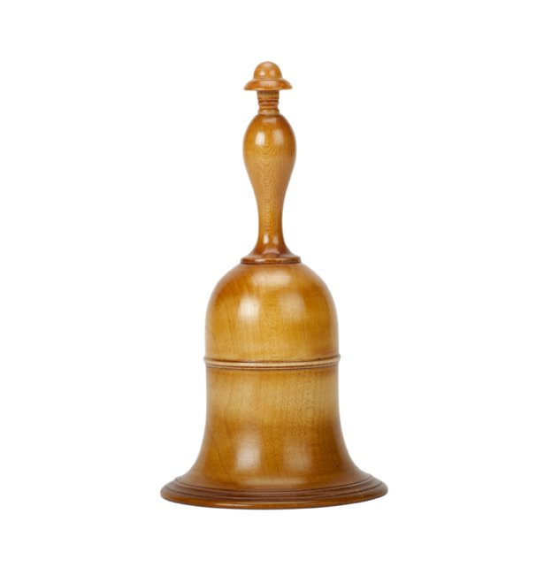 Millet Bell. Lake Forest, John McKinven, ca. 1985.: Millet Bell. Lake Forest, John McKinven, ca. 1985. A quantity of seed, dry rice, or millet appears underneath this wooden bell. Hand-turned hardwood vase with clapper. 6 ¾” tall. Hallmarked. Very g