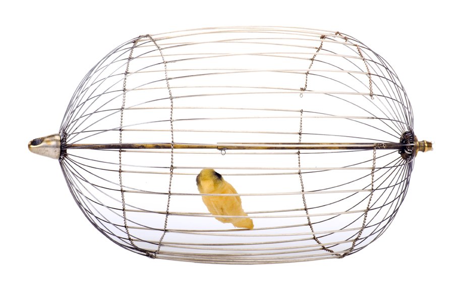 Round De Kolta-type Vanishing Birdcage. McKinven: Round De Kolta-type Vanishing Birdcage. Lake Forest, John McKinven, ca. 1985. An oval metal cage vanishes from between the magician’s hands. Brass and wire cage modeled on the original design of the