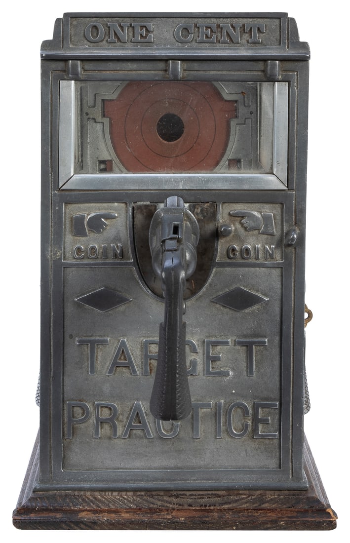 Norris 1 Cent Target Practice Countertop Game. Columbus, OH...: Norris 1 Cent Target Practice Countertop Game. Columbus, OH: Norris Mfg. Co., ca. 1922. Cast iron and glass cabinet with wooden base. When a penny is deposited into the gun, the player shoots the penn