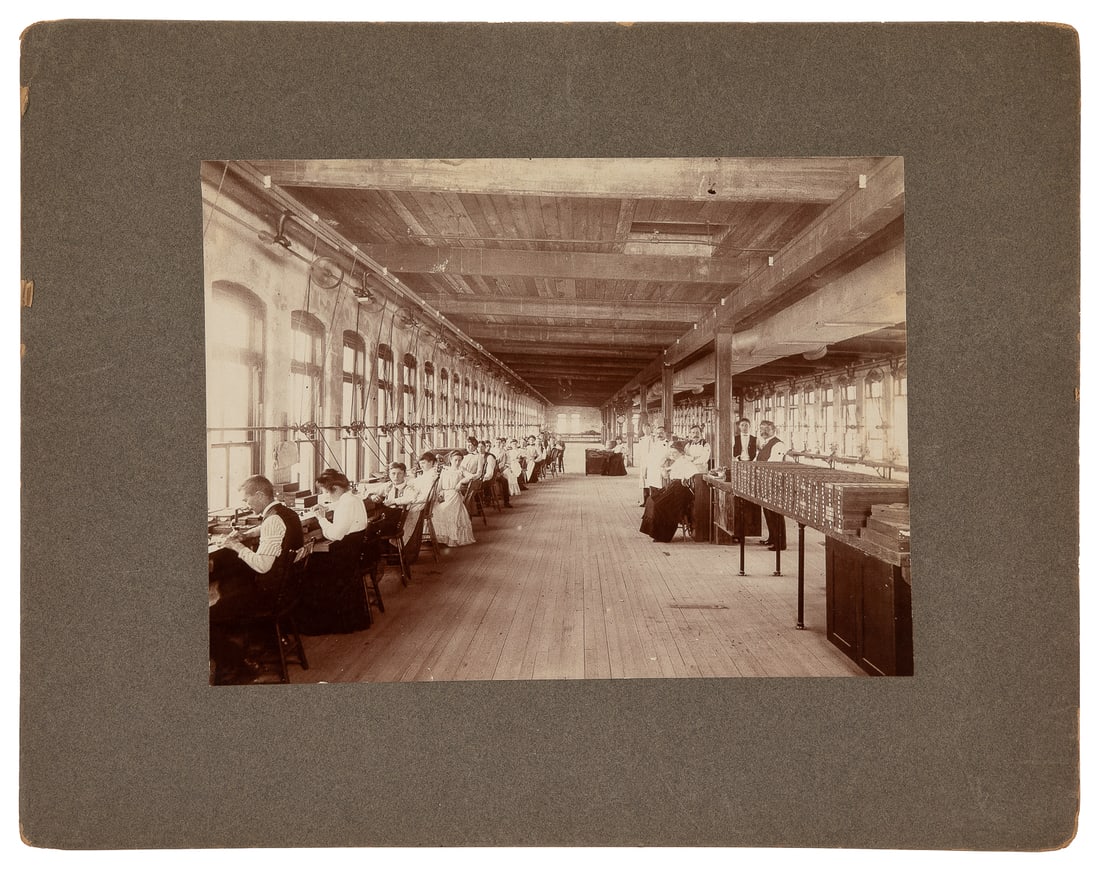 South Bend Watch Factory Original Photograph. Circa 1900s. ...: South Bend Watch Factory Original Photograph. Circa 1900s. Black and white photograph of men and women (and possibly at least one child) working at the legendary watch company. Photograph mounted on c