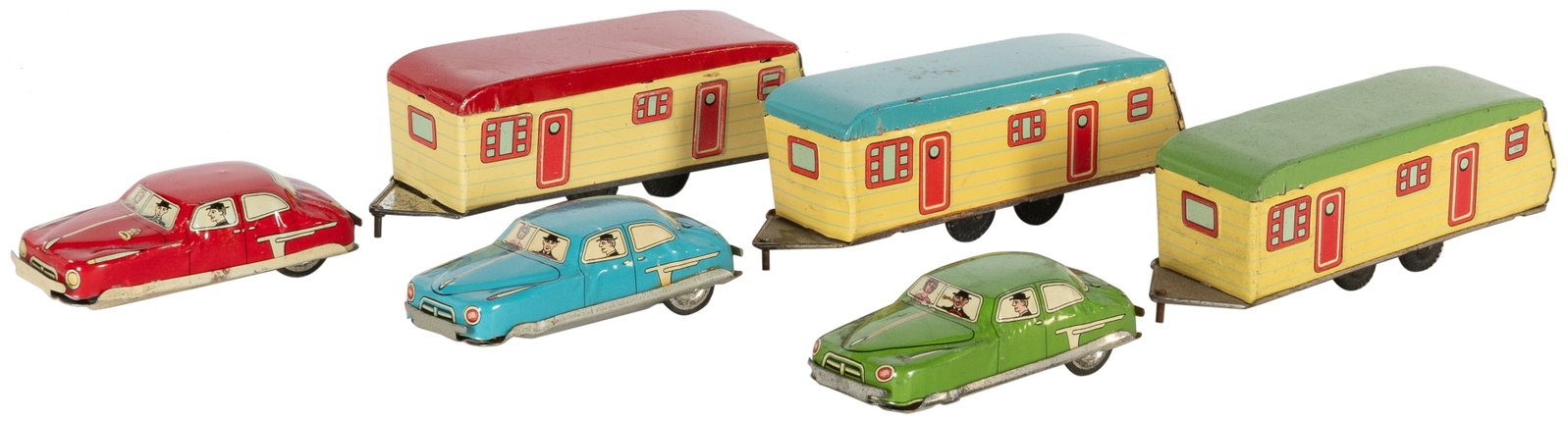 Group of Three Tin Ichimura Japanese Friction Cars with Tra...: Group of Three Tin Ichimura Japanese Friction Cars with Trailers. Japan: Ichimura, ca. 1950s. Red, green and blue cars and trailers. Cars approximately 3” long, trailers approximately 4 ½&#