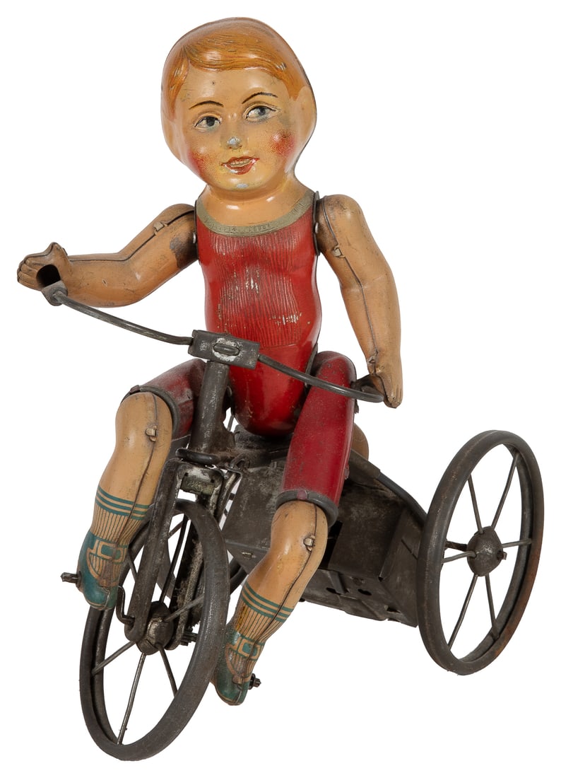 Wind-Up Boy on Tricycle Toy. American: ca. 1920s. Tin litho... (1 of 2)