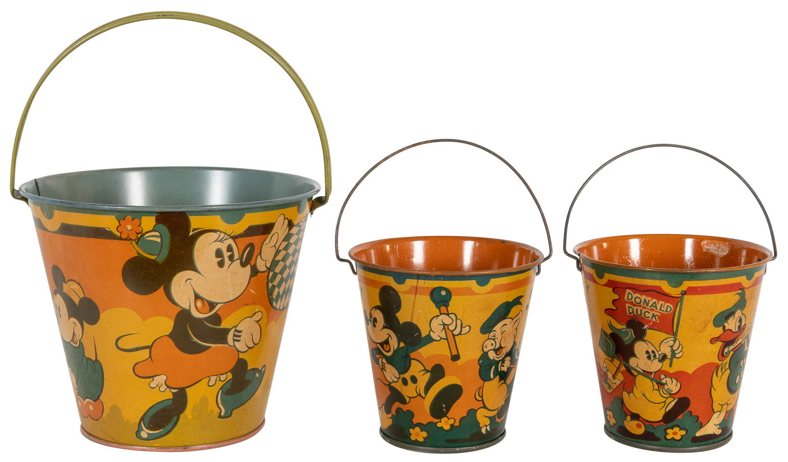 Three Disney Happynak Seaside Sandpails. England: [1930s]. ... (1 of 2)