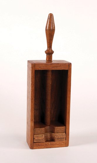 Wooden Faro Card Press. Maker unknown, ca. 1890.: Wooden Faro Card Press. Maker unknown, ca. 1890. Used to press packs of cards to keep moisture from warping them. 15 x 4 ½ x 2 ¾”. VG.