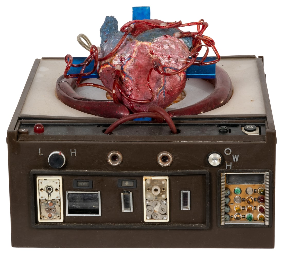 [AUTOMATA] ADLER, Iris (American 20th century) Heart #15, E...: [AUTOMATA] ADLER, Iris (American 20th century) Heart #15, Eccentric Machine. [Ca. 1980s}. 10 h x 10 w x 10” d, (height dimensions variable to 8” when operating). Mechanized mixed media con
