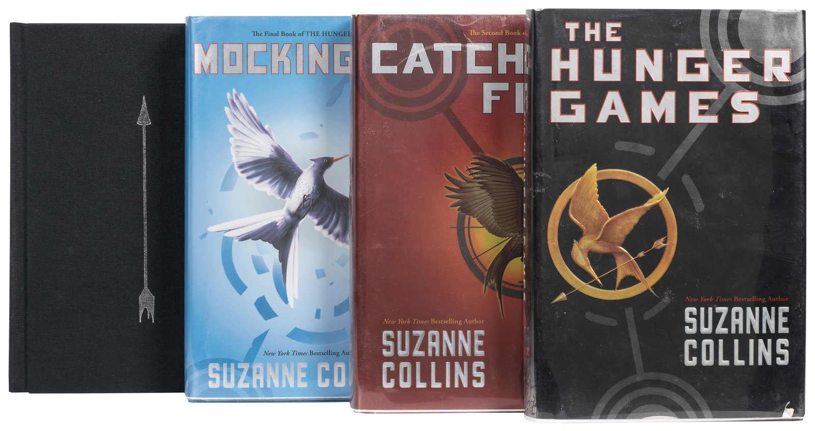 COLLINS, Suzanne. [The Hunger Games trilogy:] The Hunger Ga...: COLLINS, Suzanne. [The Hunger Games trilogy:] The Hunger Games. 2008. -- Catching Fire. 2009. -- Mockingjay. 2010. All published in New York by Scholastic Press. 3 volumes, 8vo. Original boards (some 