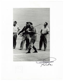 [CASTRO, Fidel Alejandro (1926-2008)]. KORDA, Alberto (1928...: [CASTRO, Fidel Alejandro (1926-2008)]. KORDA, Alberto (1928-2001). Photograph of Fidel Castro Playing Golf. 1960, though this is a later printing. On glossy paper. 8 ¼ x 5 ½”; sheet