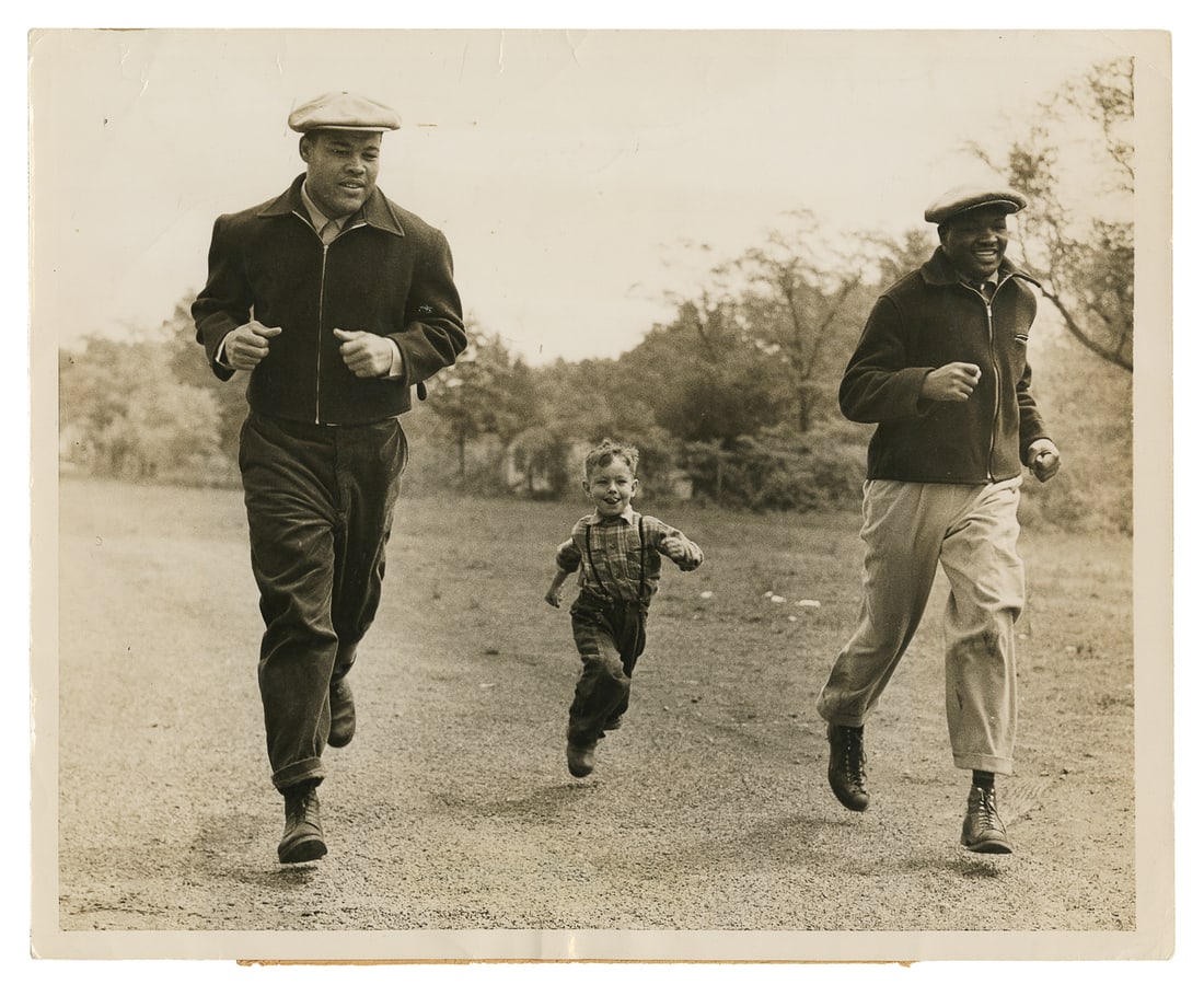 [BOXING]. Press Photo of Joe Louis Training with Freddy Wil... (1 of 2)