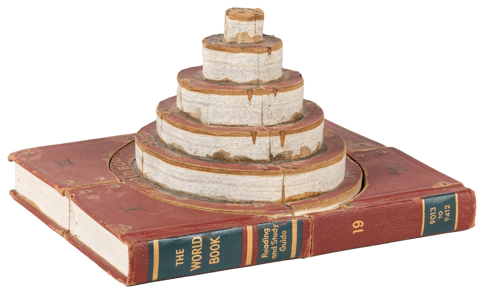 WHARTON, Margaret (American, 1943-2014). Untitled. Circa 19...: WHARTON, Margaret (American, 1943-2014). Untitled. Circa 1980s. Textbook, nails, wood. Unsigned. Five-piece readymade textbook sculpture resembling a tiered cake. Cover reads “The World Book Enc