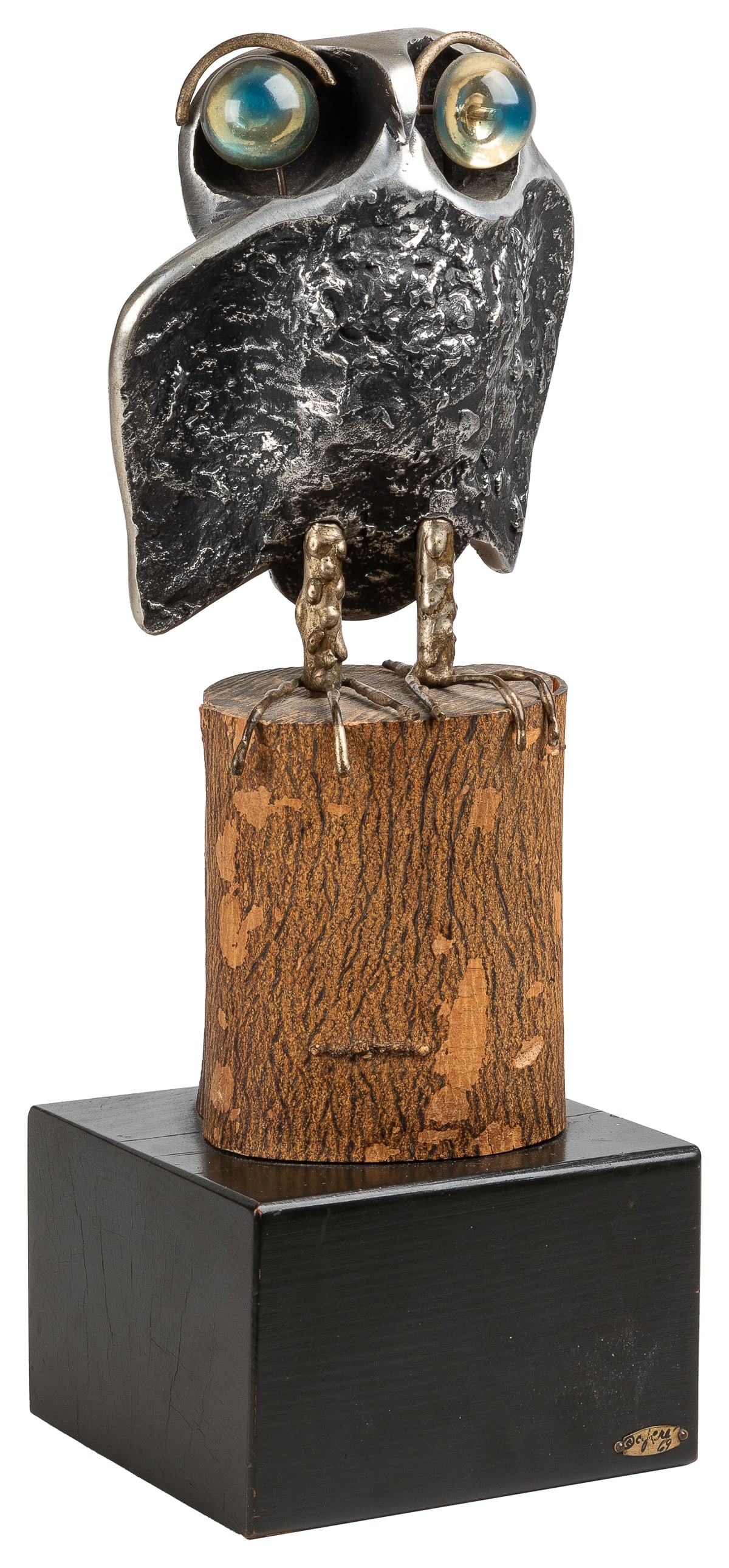 JERE, Curtis. (American, 1910-2008) Owl Sculpture. Los Ange...: JERE, Curtis. (American, 1910-2008) Owl Sculpture. Los Angeles: Artisan House, 1969. Metal, glass, wood. Signed and dated lower right plaque. Metal owl with blue/green glass eyes perched on a wooden s
