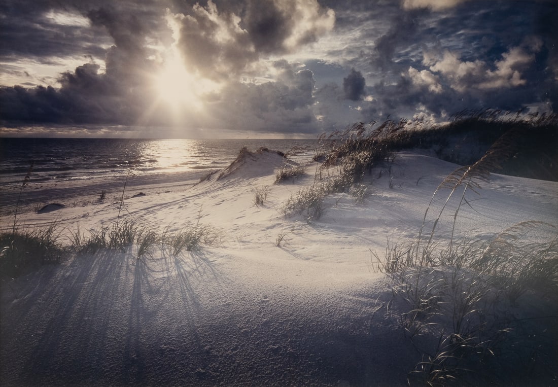 BUTCHER, Clyde (American, 20th Century). Dunes. 1983. Color...: BUTCHER, Clyde (American, 20th Century). Dunes. 1983. Color print. Signed and numbered recto and verso on mat. Edition: 202/250. Sight: 13 ¼ x 19 ¼”. Sheet: 14 x 20”. Frame (glas