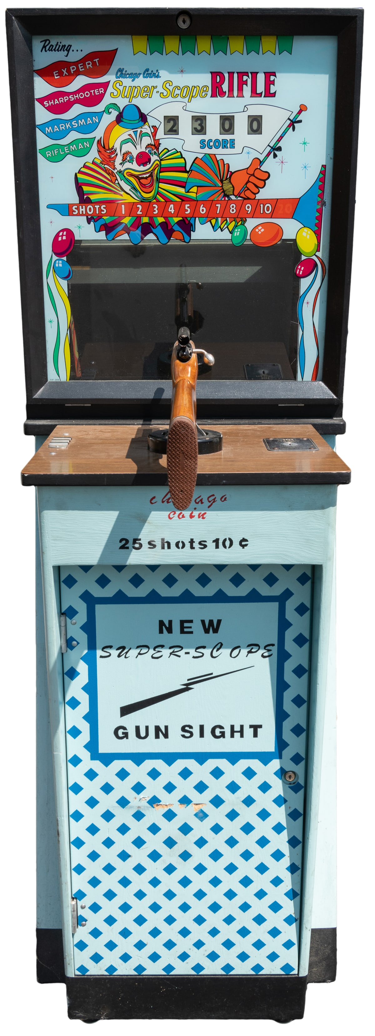 Chicago Coin’s Super-Scope Rifle / 25 Shots 10 Cents Stand-...: Chicago Coin’s Super-Scope Rifle / 25 Shots 10 Cents Stand-Up Arcade Game. Chicago: Chicago Coin, ca. 1966. Full-size arcade game with painted wooden cabinet, glass-fronted target area and score