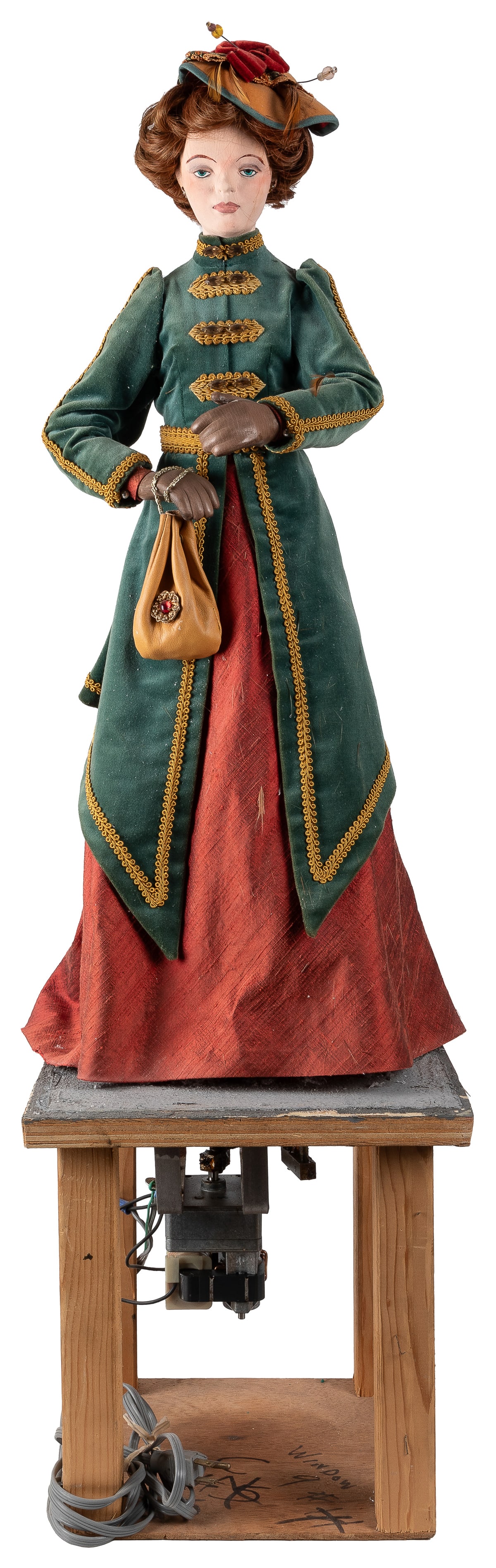 “Female in Tangerine Dress and Green Coat with Hat and Purs... (1 of 2)