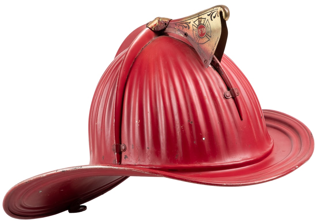 Cairns & Brother Firefighter Helmet. Clifton: Cairns & Brot...: Cairns & Brother Firefighter Helmet. Clifton: Cairns & Brother. All-metal helmet with brass shield holder, painted red. With manufacturer’s label affixed inside; without cushion. Likely repainte