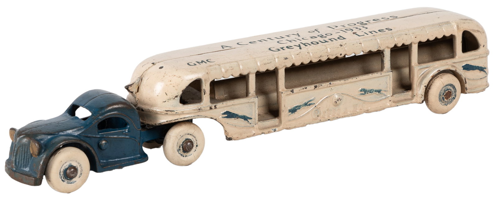 A Century of Progress Cast Iron Greyhound Bus. Chicago: GMC...: A Century of Progress Cast Iron Greyhound Bus. Chicago: GMC, 1933. Cast-iron Greyhound bus from the Chicago World’s Fair, A Century of Progress International Exposition. Length 10”. Scatte
