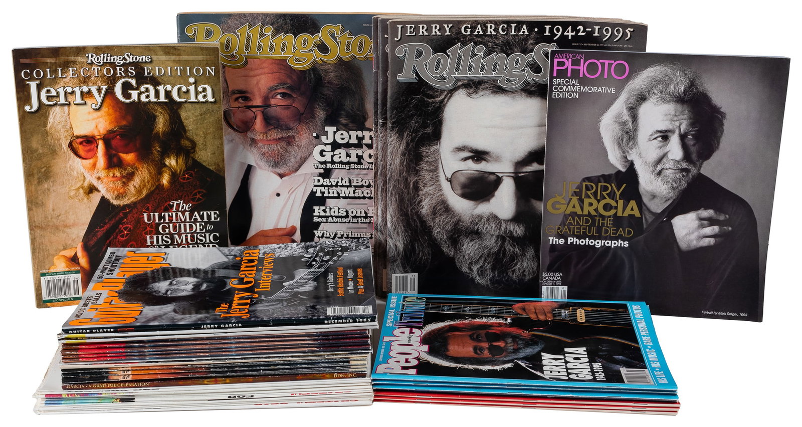 [GARCIA, Jerry (1942-1995)]. Jerry Garcia Commemorative Per...: [GARCIA, Jerry (1942-1995)]. Jerry Garcia Commemorative Periodicals and Ephemera. 1995. Including: Garcia A Grateful Celebration: Presented by Dupree’s Diamond News. New Jersey: John Dwork and S