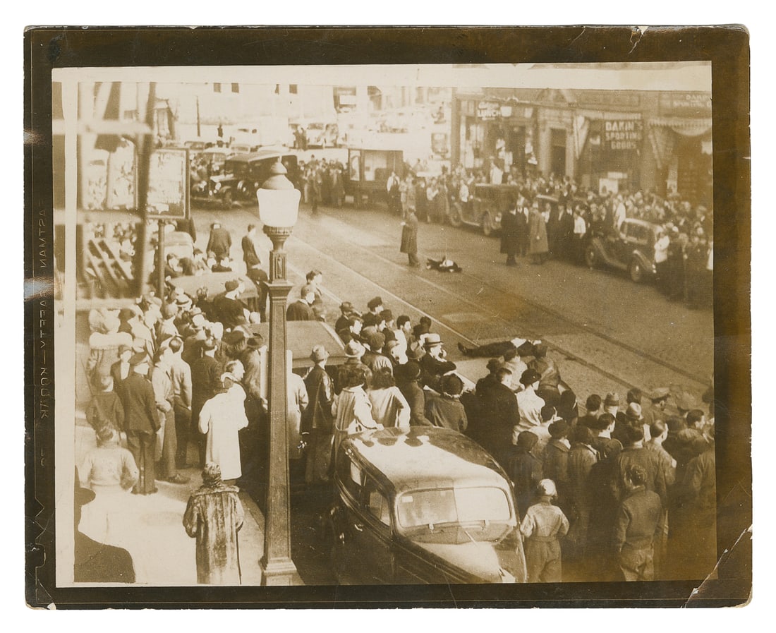 [CRIME]. Photograph of the Brady Gang Shoot-Out. Bangor, Ma...: [CRIME]. Photograph of the Brady Gang Shoot-Out. Bangor, Maine, 1937. Photograph of the scene of the shootout of the Brady gang, showing Alfred “Al” Brady and Clarence Lee Shaffer, Jr. dea