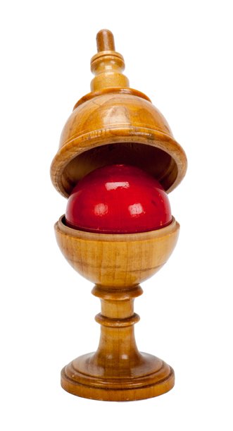Morrison Pill Box. German, ca. 1930.: Morrison Pill Box. German, ca. 1930. A ball vanishes, then reappears inside the wooden vase from which it was removed. 5 ¾” high. Finish of ball and shells chipped, otherwise good.