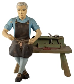Cobbler Trade Statue. Painted hard rubber statue of a cobbl...