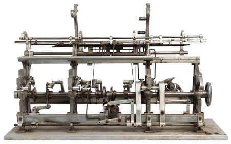 [MACHINE MODELS]. Pair of Aluminum Machine Models. [Ca. 20t...