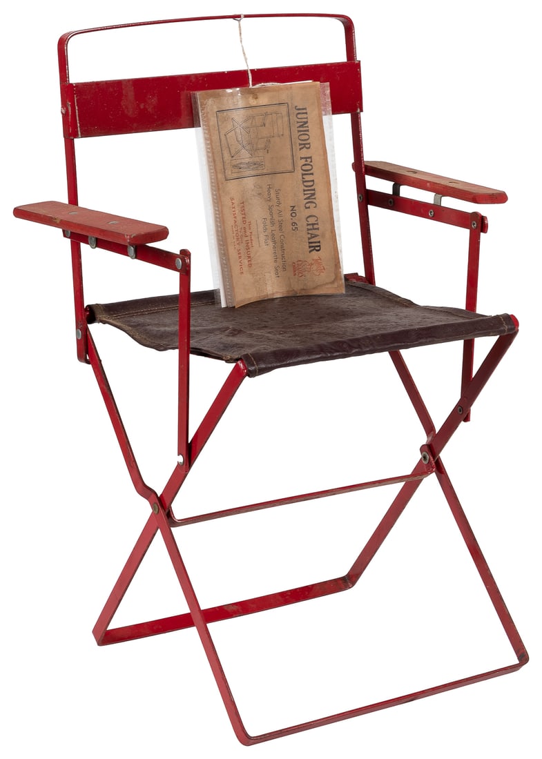 Teddy Tot Junior Folding Chair No. 65. USA, ca. 1950s. Chil...: Teddy Tot Junior Folding Chair No. 65. USA, ca. 1950s. Child’s folding wooden and metal chair with vinyl/leatherette seat. Retains original manufacturer’s tag. Height 19 ½”. Lig