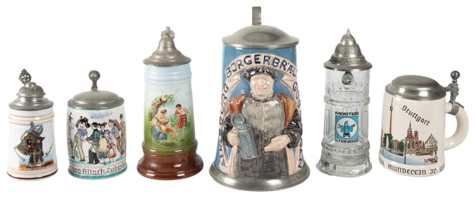 Group of Six Steins. Six German beer steins, all with pewte...