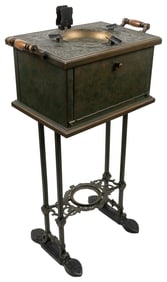 Ornate Smoking Stand. Metal body with decorative top design...