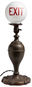 Exit Light Table Lamp. Spun metal lamp with heavily cast ba...