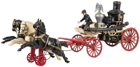 Cast Iron Three-Horse Fire Engine Toy. Horse-drawn fire eng...