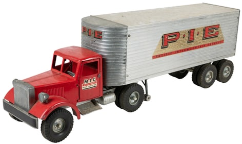 Toy M.I.C. Semi-Truck Cab and Two Fruehauf Trailers. 20th c...